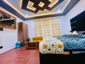 TV a/nebo společenská místnost v ubytování Evergreenheights