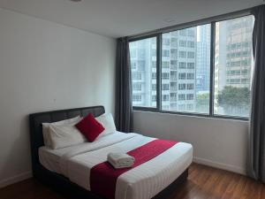 Ένα ή περισσότερα κρεβάτια σε δωμάτιο στο Summer popular suites kl Bukit Bintang +32 φωτογραφίες