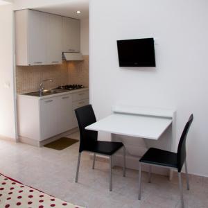 Virtuvė arba virtuvėlė apgyvendinimo įstaigoje Le Casette di Vita