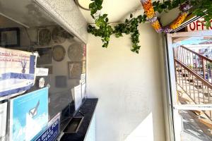 a store front with a window and a door at Travel Inn Downtown LA in Los Angeles