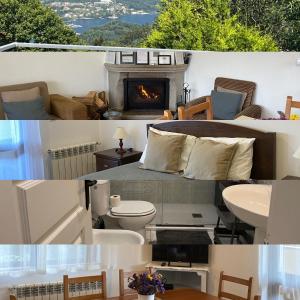 a room with a fireplace and a bathroom with a toilet at Casa de Casarelhos - Andar de Moradia - Lareira - Vistas - Gerês in Geres