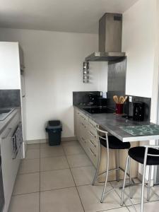 Η κουζίνα ή μικρή κουζίνα στο Studio 4 personnes +1 φωτογραφίες