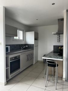 Η κουζίνα ή μικρή κουζίνα στο Studio 4 personnes