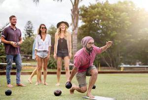 a group of people playing a game of bowling at Stunning Home In Lärbro With One Bedroom in Kappelshamn +2 photos