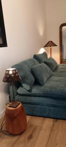 Postel nebo postele na pokoji v ubytování Gîte à la ferme