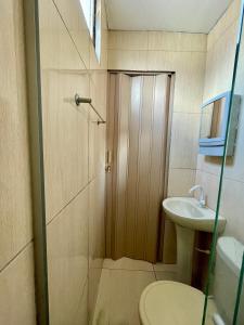 Ένα μπάνιο στο Suite confortável