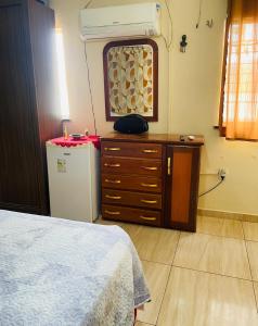 Η κουζίνα ή μικρή κουζίνα στο Suite confortável