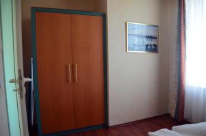 Postel nebo postele na pokoji v ubytování Loui´s FeWo Wiek