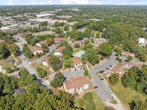 an aerial view of a school campus with trees at Modern 3BR 2 bathroom Near High Point University & Market Sleeps 6 in High Point