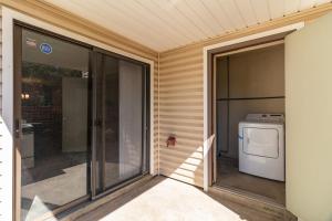an outside view of a kitchen with sliding glass doors at Modern 3BR 2 bathroom Near High Point University & Market Sleeps 6 in High Point