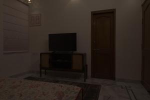 TV a/nebo společenská místnost v ubytování PichwaiHouse