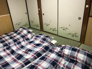 Ένα ή περισσότερα κρεβάτια σε δωμάτιο στο YabFarm Lodge 101