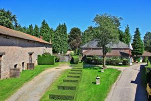 an estate with a garden and a building and a road at Hôtellerie de Plein Air Camping Leychoisier in Bonnac-la-Côte