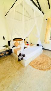 Villa Tamarind - Tangalle房間的床