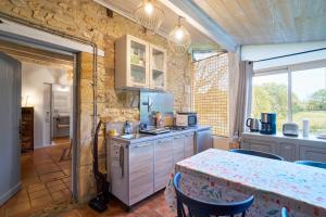 Η κουζίνα ή μικρή κουζίνα στο The Duplex - Domaine De L'ô