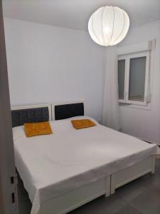 Voodi või voodid majutusasutuse Villa de vacance proche de la plage toas