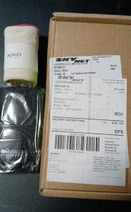 a box with a soccer ball and a receipt at Bros Apartment in Buzau