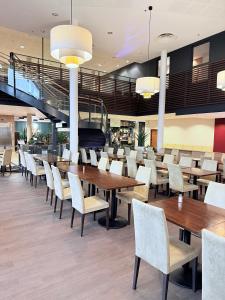 Εστιατόριο ή άλλο μέρος για φαγητό στο Premium Chalet huoneisto kylpylän vieressä