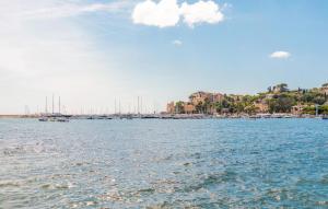 a view of a harbor with boats in the water at 2 Bedroom Gorgeous Apartment In Rapallo in San Michele di Pagana