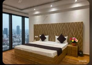 Postel nebo postele na pokoji v ubytování Golden Sky