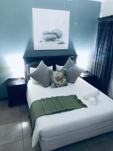 Ένα ή περισσότερα κρεβάτια σε δωμάτιο στο Zestees bed and breakfast