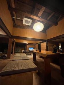 Postel nebo postele na pokoji v ubytování しっぽのそよ風