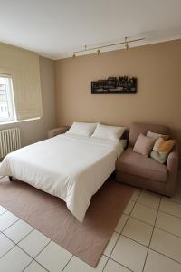 Postel nebo postele na pokoji v ubytování Ô Mistral Appartement