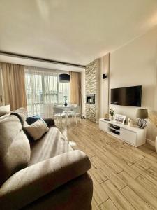 TV a/nebo společenská místnost v ubytování Nice Stay Apartment by Rentoom