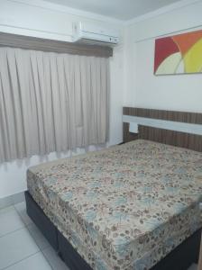 Ένα ή περισσότερα κρεβάτια σε δωμάτιο στο Flats Lacqua diRoma Roberto Imoveis +32 φωτογραφίες