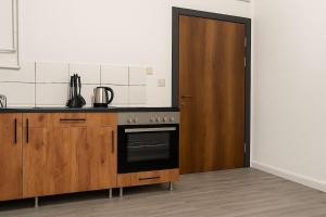 Kuchyň nebo kuchyňský kout v ubytování Livemore24 Apartment 1 in Herten 24-7 Check-In