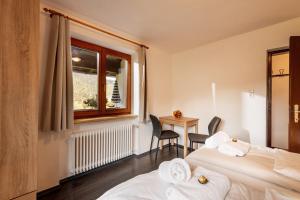 Postel nebo postele na pokoji v ubytování Appartement Maierlblick