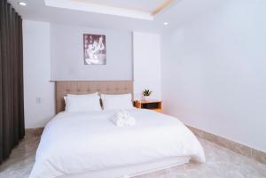 Ένα ή περισσότερα κρεβάτια σε δωμάτιο στο The July - Coliving by Kegotel