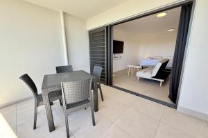 Ένα ή περισσότερα κρεβάτια σε δωμάτιο στο Studio Vairagi City brand new in the center of Papeete WiFi -Netflix -AC