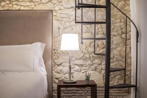 A bed or beds in a room at Arcipelago 41