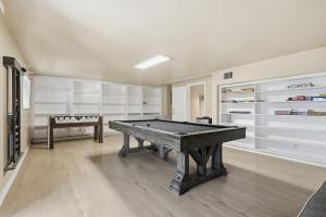 a room with a ping pong table in it at Spacious Mountain Getaway Game Room & Gazebo villa in Pine Mountain Club