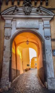 an entrance to a building with an archway at Residenza dei Papi - Luxury City House in Castel Gandolfo