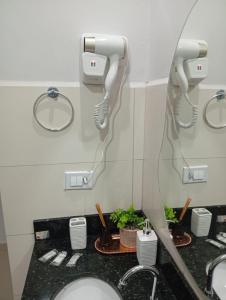 Phòng tắm tại Apartamento Clube Tô de Boa