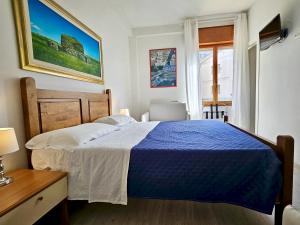 Un pat sau paturi într-o cameră la Affittacamere Miri