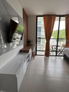 Μια τηλεόραση ή/και κέντρο ψυχαγωγίας στο Exclusivo Apartamento en Santa Marta