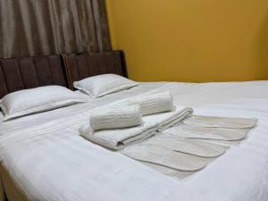 Ένα ή περισσότερα κρεβάτια σε δωμάτιο στο Siren Hotel