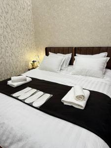 Ένα ή περισσότερα κρεβάτια σε δωμάτιο στο Siren Hotel