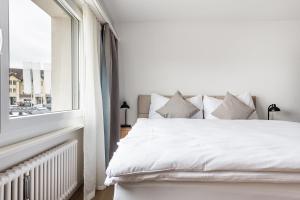 Postel nebo postele na pokoji v ubytování GOLD-APARTMENT 3 !Gratis Parken, Free Parking! + 5 fotografií