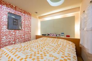 Giường trong phòng chung tại Hotel Mist -Adult Only-CHIBA