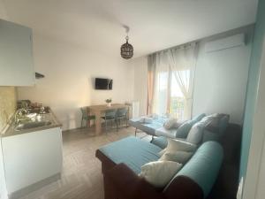 a living room with a couch and a table at Di Michi in Torre del Greco