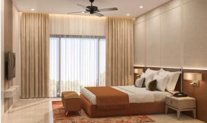 a bedroom with a bed and a large window at The Astor - All Suites Hotel Candolim Goa in Candolim +73 photos