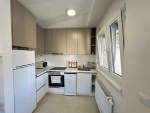 Kuchyň nebo kuchyňský kout v ubytování A&A Sarajevo + 9 fotografií