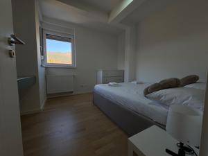 Postel nebo postele na pokoji v ubytování A&A Sarajevo