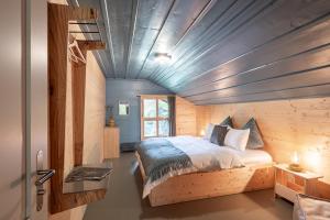 Ένα ή περισσότερα κρεβάτια σε δωμάτιο στο Chalet Verve