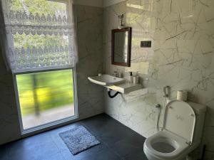 Afbeelding uit fotogalerij van Bamboo Tree Villa 