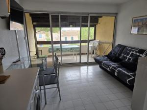 Χώρος καθιστικού στο Cap d'Agde - T2 lumineux piscine et tennis